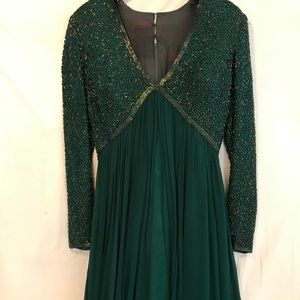 Lovely vintage emerald green evening gown.